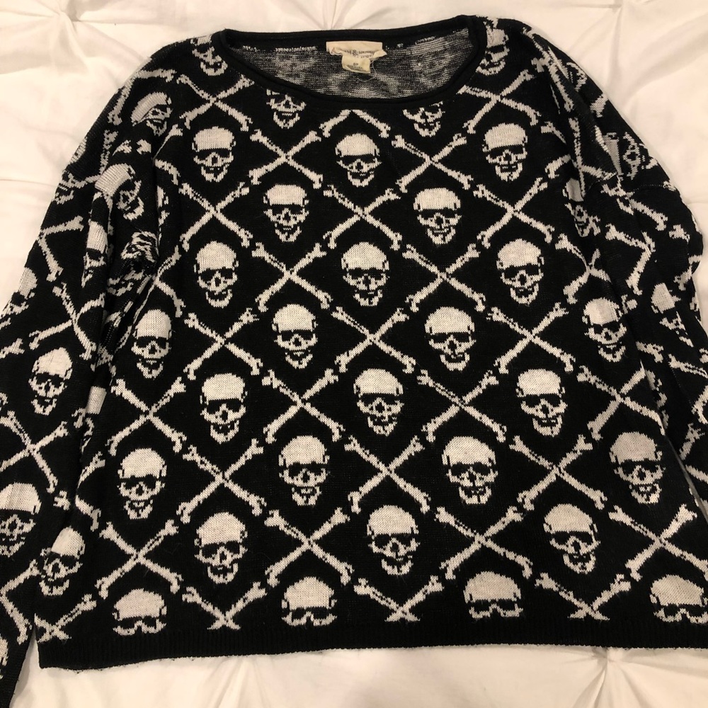 In GUC, awesome vintage skull sweater.
